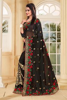 Picture of Bold black saree with red & green resham