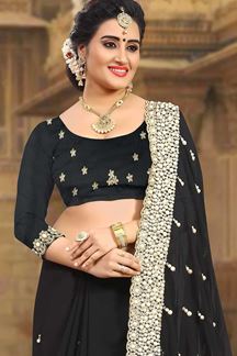 Picture of Dignified black designer saree with zari