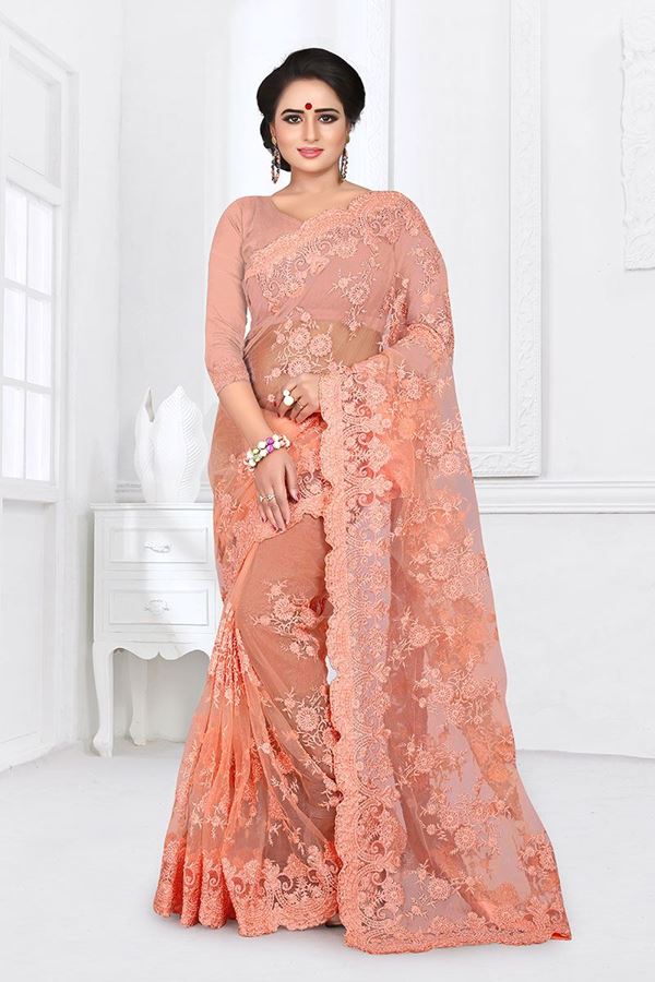 Picture of Flamboyant Light Orange Colored Partywear Embroidered Netted Saree