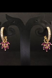 Picture of Gold plated, pink stone worked earrings