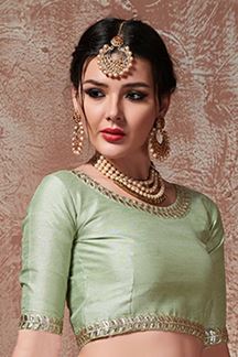 Picture of Pistachio Color Party Wear Net Flared Lehenga Choli