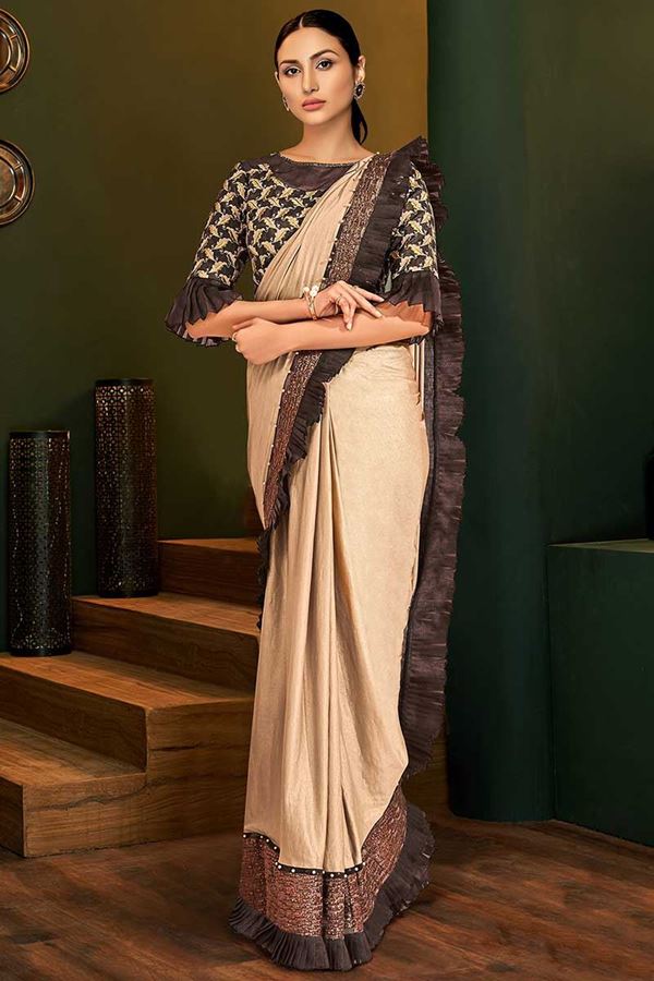 Picture of Pleasant Beige & Brown Colored Partywear Lycra Saree