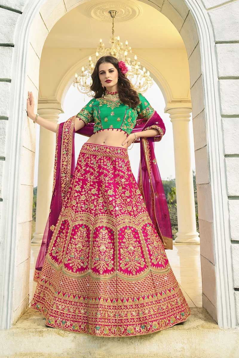 pink and green bridal lehenga