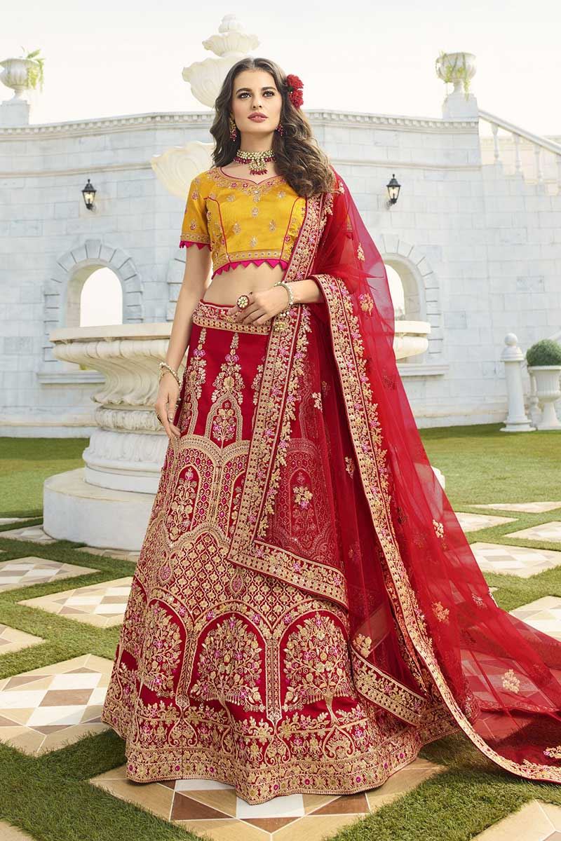 red and yellow bridal lehenga