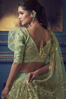 Picture of Stunning Green colored beautiful lehenga choli 