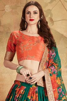 Picture of Vibrant Orange and Green Colored Lehenga Choli