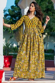 Picture of Yellow Colored Partywear Printed Muslin Kurti