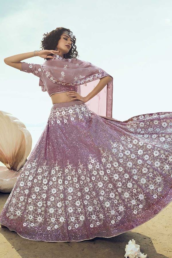 Picture of Exotic Lilac Colored Partywear Embroidered Net Lehenga Choli