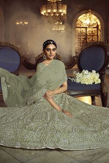 Picture of Graceful Green Colored Partywear Net Lehenga Choli