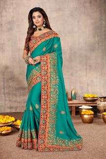 Picture of Charming Rama Colored Festive Wear Satin Saree 