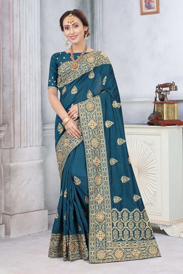Picture of Peacock Blue Colored Partywear Vichitra Blooming Silk