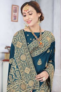 Picture of Peacock Blue Colored Partywear Vichitra Blooming Silk