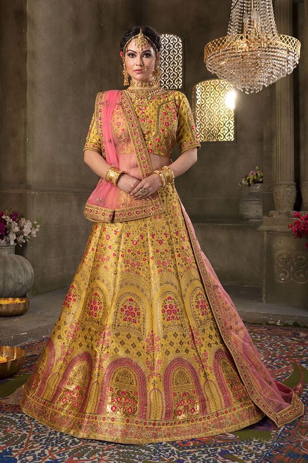 Picture of Mustard Yellow Colored Embroidered Silk Lehenga Choli With Net Dupatta