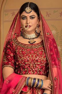 Picture of Marron Colored Embroidered Silk Lehenga Choli With Net Dupatta
