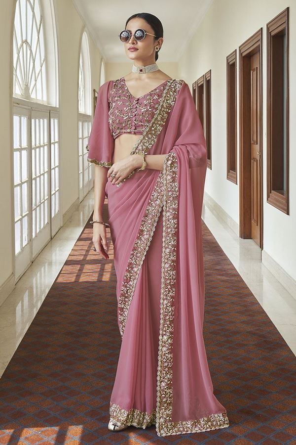 Picture of Charming Pink Colored Georgette Saree