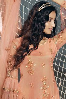 Picture of Refreshing Peach Colored Partwear Net Suit (Unstitched suit)