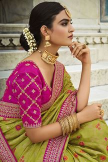 Picture of Charming Parrot Green and Pink Colored Designer Saree
