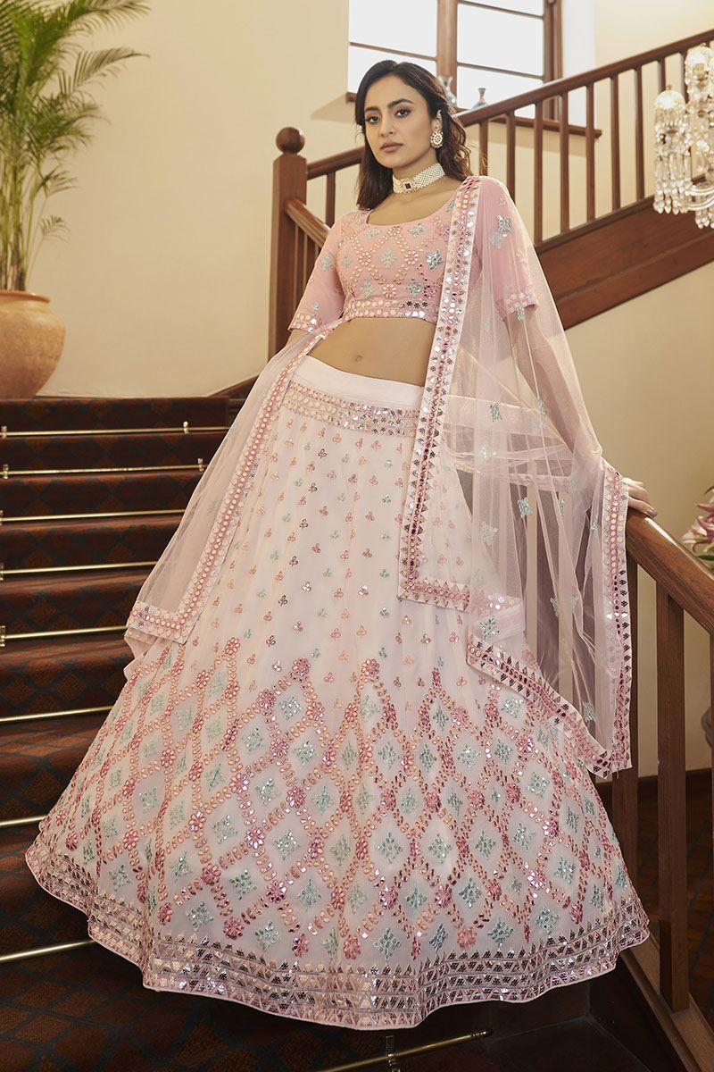 Buy Ivory Queen of Pearls Lehenga by Designer Mala and Kinnary Online at  Ogaan.com