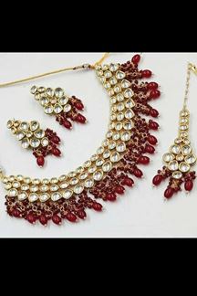 Picture of Irresistible Maroon Colored Premium Choker with a pair of Earrings and Mangtikka