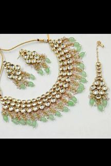 Picture of Glorious Pista Green Colored Premium Choker with a pair of Earrings and Mangtikka