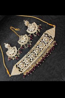 Picture of Mesmerizing Maroon Colored Premium Choker with a pair of Earrings and Mangtikka
