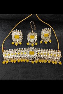 Picture of Artistic Yellow Colored Premium Choker with a pair of Earring and Mangtikka