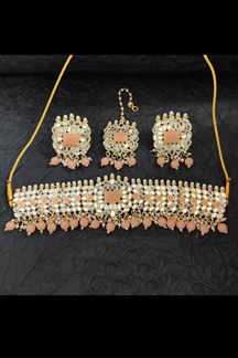 Picture of Magnificent Peach Colored Premium Choker with a pair of Earring and Mangtikka