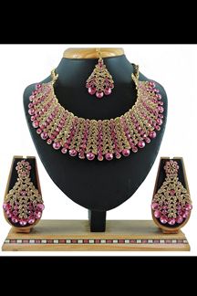 Picture of Marvelous Pink and Gold Colored Premium Choker with a pair of Earring