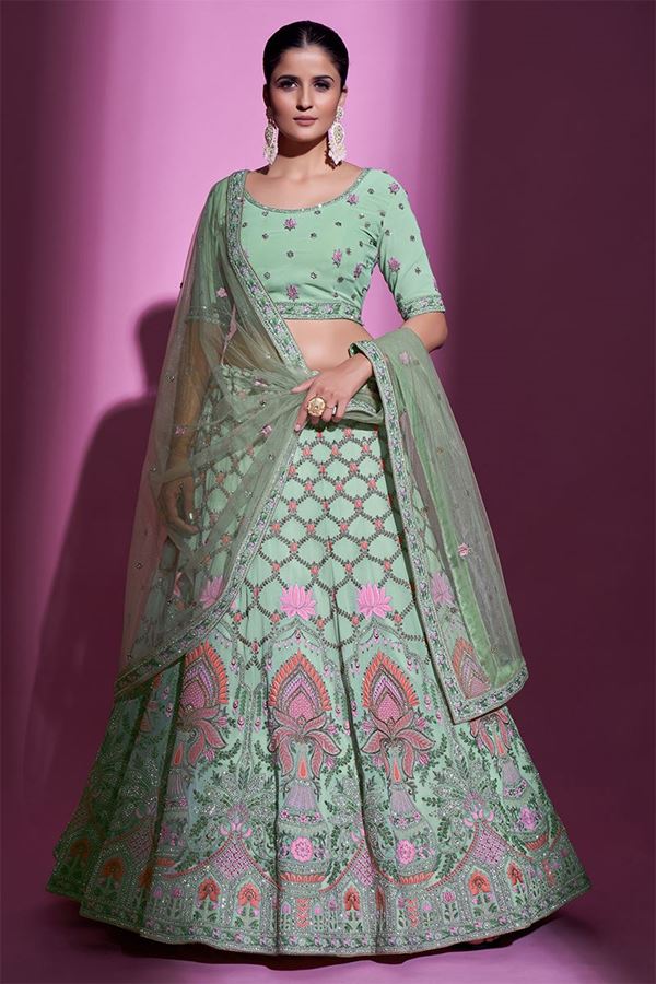 Picture of Glamorous Pista Green Colored Designer Lehenga Choli