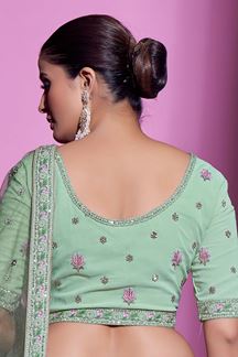 Picture of Glamorous Pista Green Colored Designer Lehenga Choli