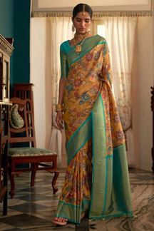 Picture of Astounding Yellow and Rama Colored Designer Silk Saree