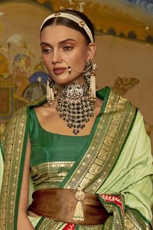 Picture of Exquisite Pista Green Colored Designer Saree