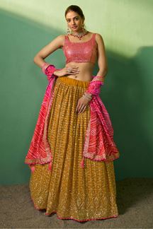 Picture of Vibrant Mustard and Pink Colored Designer Lehenga Choli