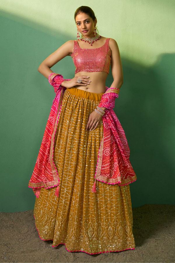 Picture of Vibrant Mustard and Pink Colored Designer Lehenga Choli