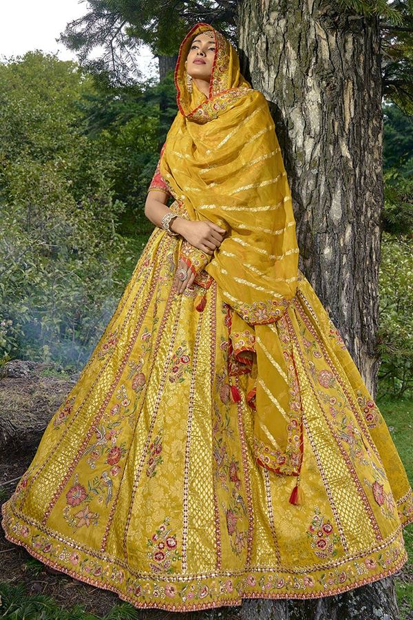 Picture of Classy Golden Yellow and Peach Colored Designer Lehenga Choli