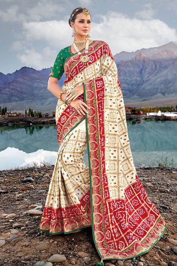 Picture of Exuberant Cream and Red Colored Designer Saree