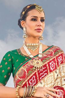 Picture of Exuberant Cream and Red Colored Designer Saree