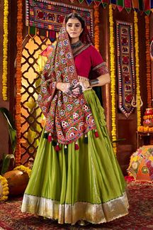 Picture of  Spectacular Pure Silk and Viscose Fluorescent Green and Red Cotton Designer Navratri Lehenga Choli for Garba Dance and Festival Celebrations