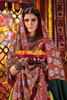 Picture of  Spectacular Pure Silk and Viscose Fluorescent Green and Red Cotton Designer Navratri Lehenga Choli for Garba Dance and Festival Celebrations