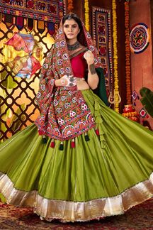 Picture of  Spectacular Pure Silk and Viscose Fluorescent Green and Red Cotton Designer Navratri Lehenga Choli for Garba Dance and Festival Celebrations